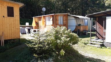 Roulotte e preingresso in legno