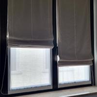 Tende a pacchetto in tessuto beige.