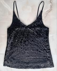 Un'elegante top ESMARA festiva con paillettes