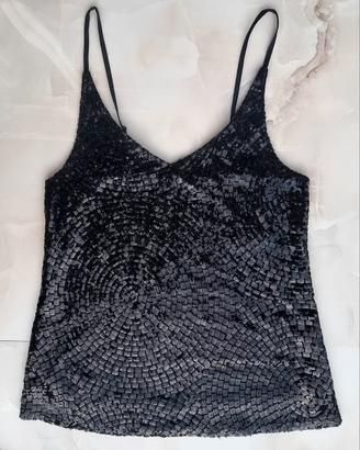 Un'elegante top ESMARA festiva con paillettes