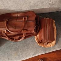 coppia di borse da viaggio in pelle