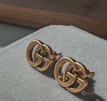 Orecchini a borchie in oro doppio Gucci