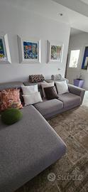 Divano con chaise lounge  , grigio in tessuto