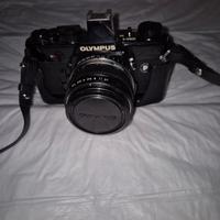 macchina fotografica  Olimpus OM-1