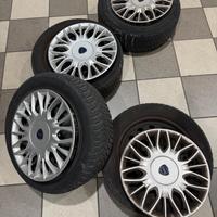 4 ruote complete originali Ypsilon + gomme M+S