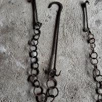 Antiche catene da camino in ferro battuto