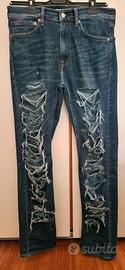 Jeans ragazzo strappati Calvin Klein - tg. S