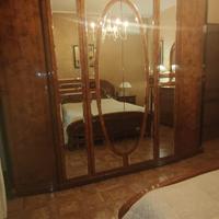 Stanza matrimoniale in legno radica di noce