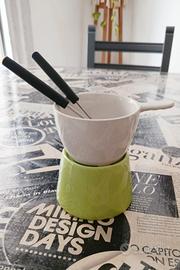 Set fonduta cioccolato in ceramica bicolore.