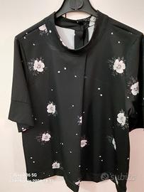 Camicetta. Nera? Collo coreana Apertura sul dietro