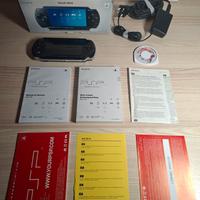 PSP con scatola, manualistica e videogioco