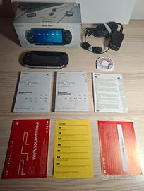 PSP con scatola, manualistica e videogioco