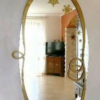 Specchio in ferro forgiato e battuto a mano