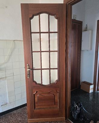 Stock 7 porte interne artigianali in noce massello