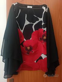 casacca elegante con apertura maniche laterali 