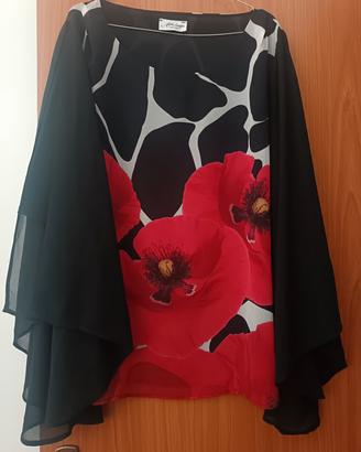 casacca elegante con apertura maniche laterali 