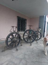 Ruote centenarie porta vasi in ferro battuto