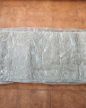 Tappeto beige in tessuto 