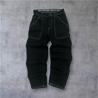 Pantaloni baggy neri con cuciture bianche