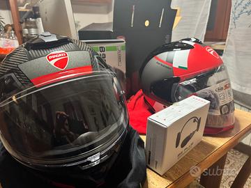 Caschi Ducati Ultra Carbon Nolan e Arai con micr