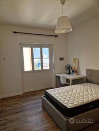 Stanza in appartamento di 56 m² a Milano