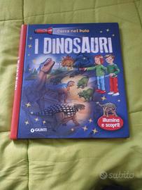 libro  nel buio vedi  i dinosauri  marca "giunti"