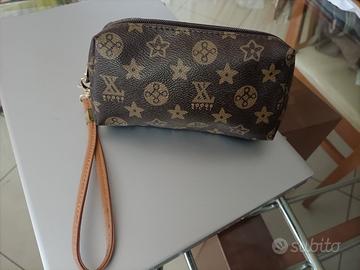  pochette da polso, non originale 