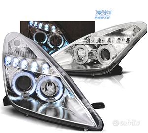 FARI PER TOYOTA CELICA T23 99-05 LED OCCHI ANGEL C
