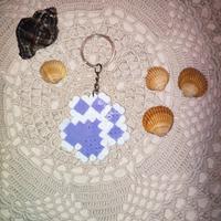 portachiavi in pyssla a forma di zampa di 🐱