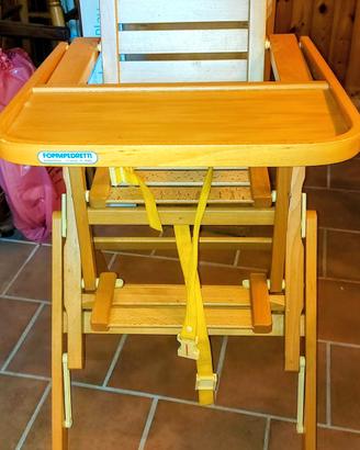 Seggiolone in legno Foppapedretti pieghevole.