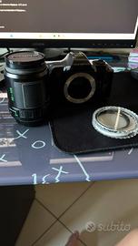 fotocamera olimpus con obbiettivo 35-105