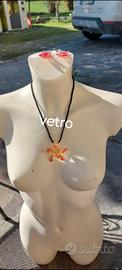 Collana con stella in vetro color oro e arancio