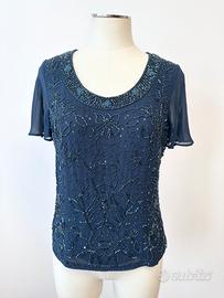 Top elegante in voille blu