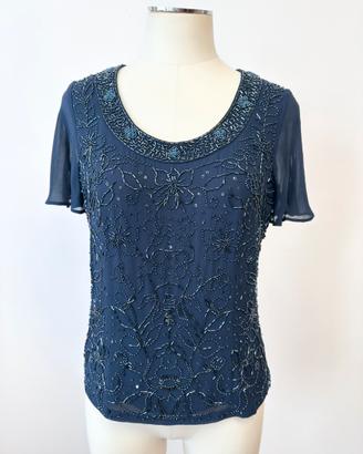Top elegante in voille blu