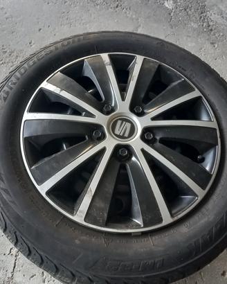 cerchi in ferro 5×100 +gomme termiche Bridgestone 