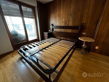 Camera matrimoniale dal sapore rustico