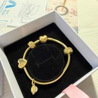Set Pandora gold Milano - bracciale + 4 charm