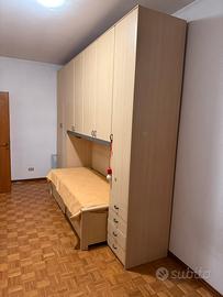 Armadio a ponte con letto