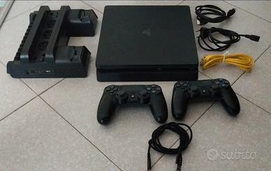 Playstation 4  1Tb + base di raffred. + 4 giochi