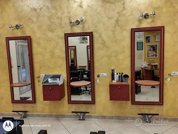 Poltrone e caschi per parrucchiera