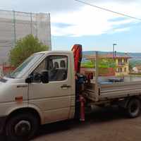 Autocarro con grù Ferrari