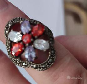 Anello a fiore 7 granati placc.argento