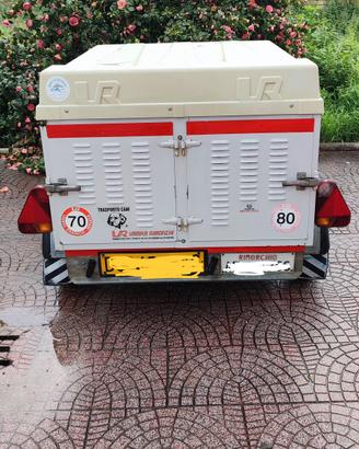 Rimorchio per trasporto cani.