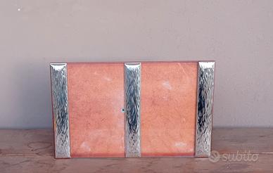 Cornice in argento