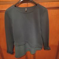 Maglia di colore verde. Taglia S
