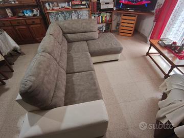 Divano con penisola con possibilità di apertura