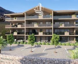 Appiano: Nuovo quadrilocale con giardino