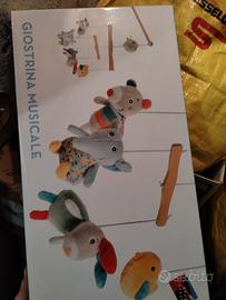 Giostrina musicale in legno Città del Sole