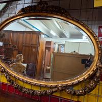 Specchio ovale cornice lavorata 