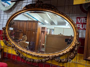 Specchio ovale cornice lavorata 